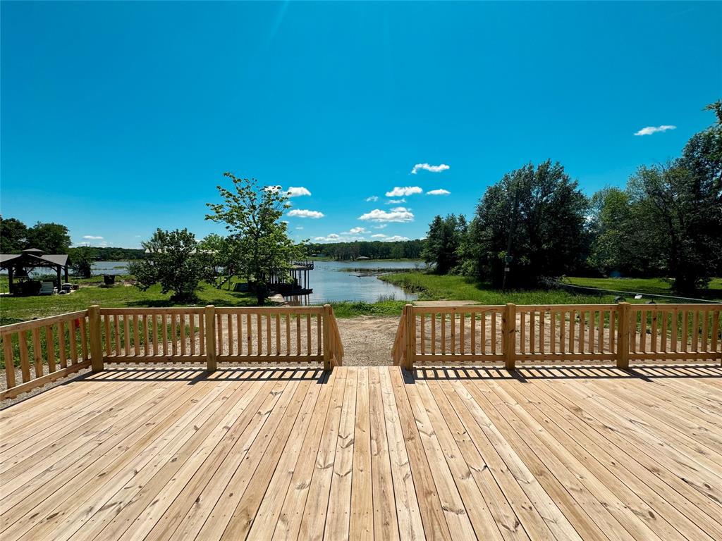 706 Sandpiper Circle Seven Points, TX 75143 - Photo 3 of 22 a view of deck with a yard