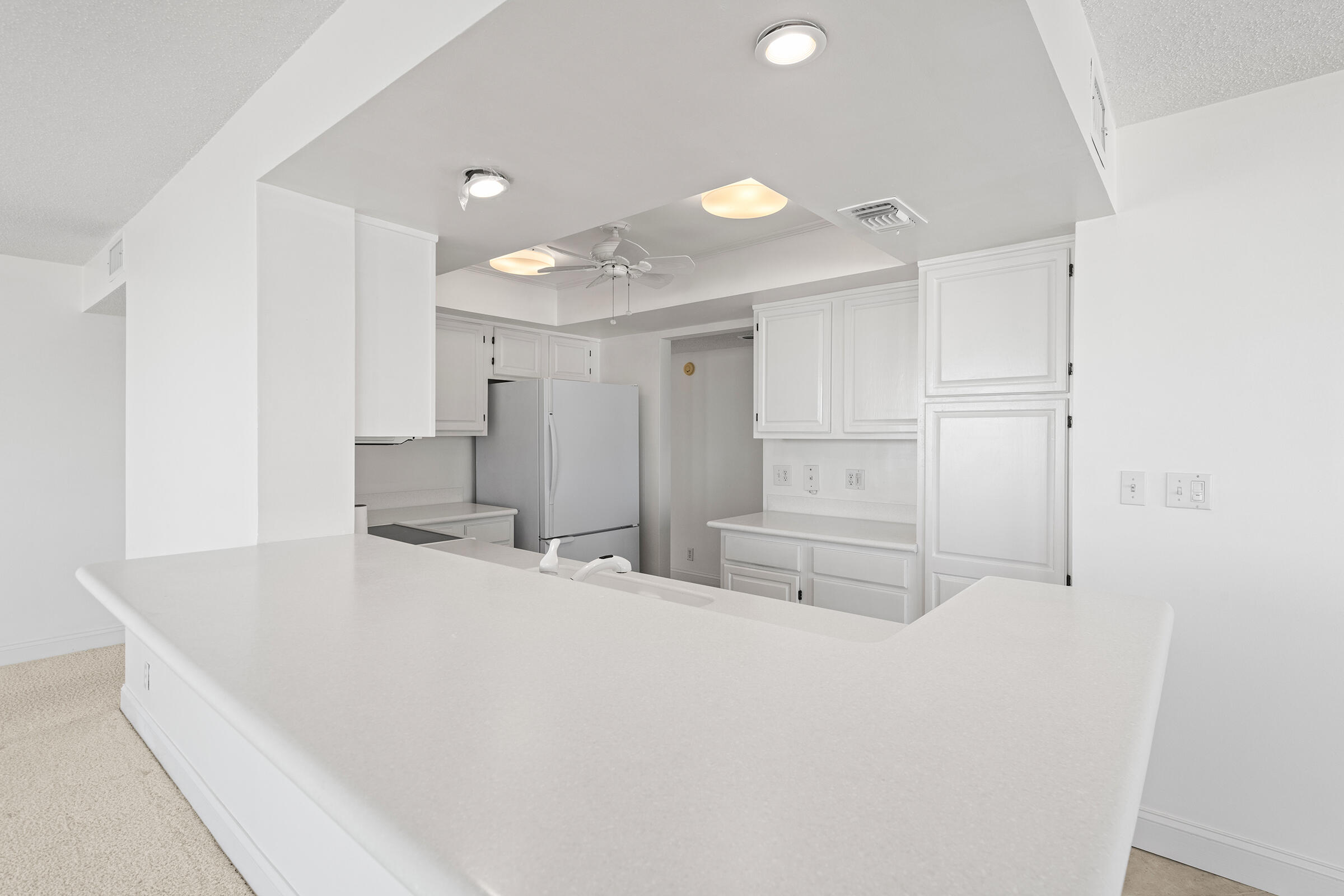 2375 Northeast Ocean Boulevard, Unit E103 Stuart, FL 34996 - Photo 11 of 49 a bathroom with a tub sink and a mirror