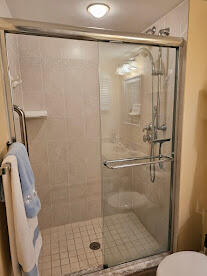 2375 Northeast Ocean Boulevard, Unit E103 Stuart, FL 34996 - Photo 31 of 49 a bathroom with a shower and toilet