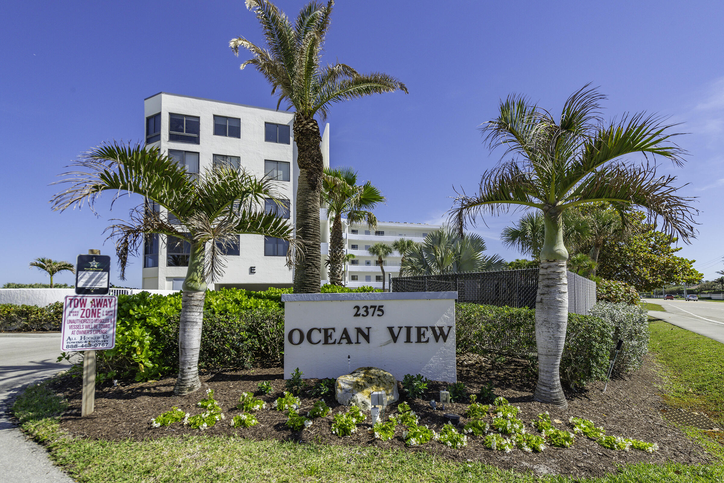 2375 Northeast Ocean Boulevard, Unit E103 Stuart, FL 34996 - Photo 39 of 49 a sign that is sitting in front of a house