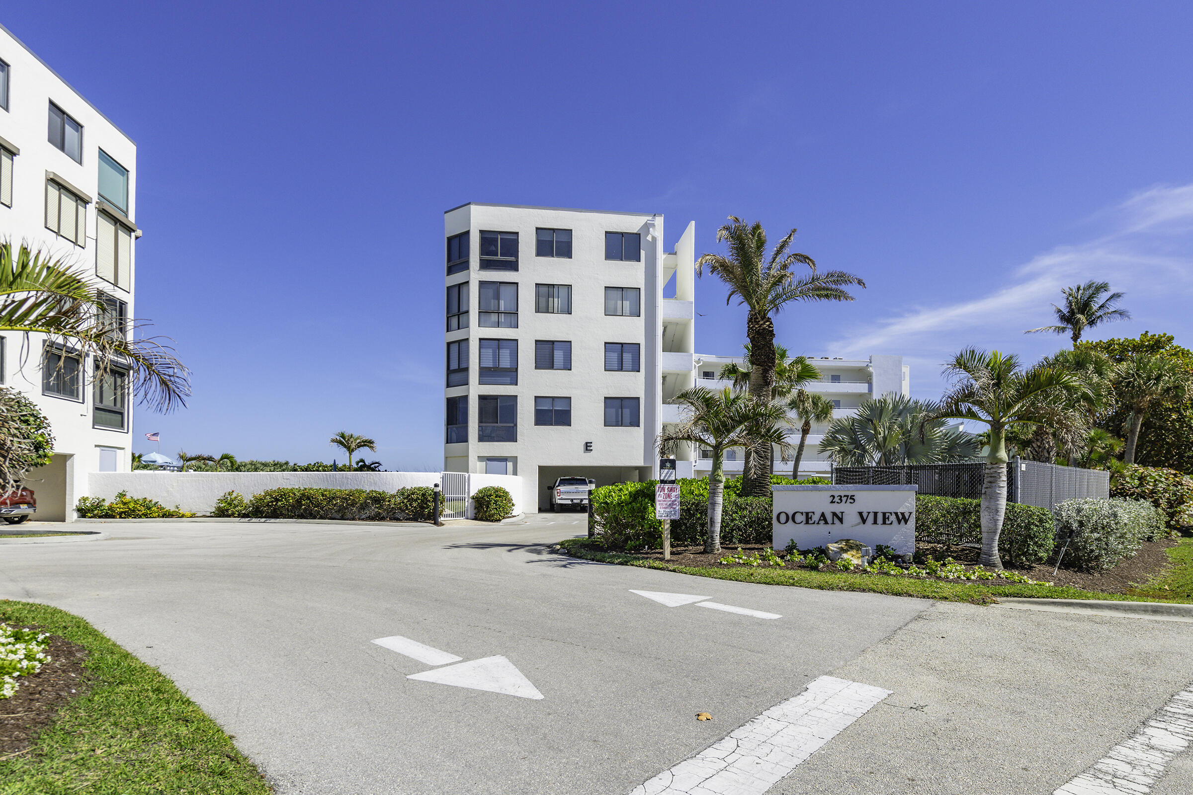 2375 Northeast Ocean Boulevard, Unit E103 Stuart, FL 34996 - Photo 40 of 49 a front view of a building with a street
