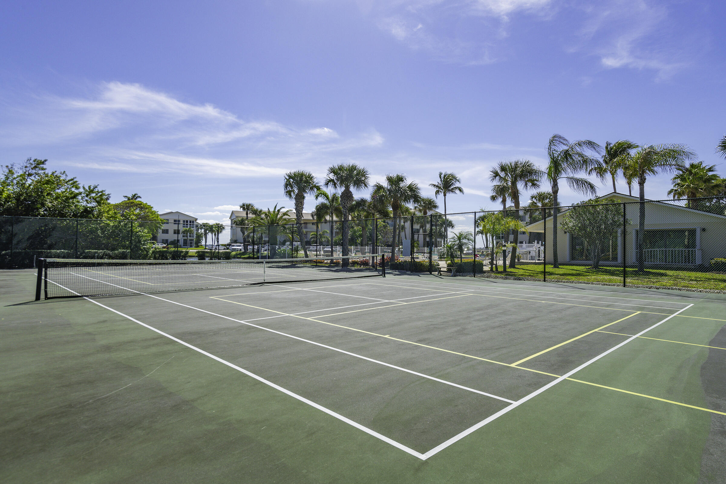 2375 Northeast Ocean Boulevard, Unit E103 Stuart, FL 34996 - Photo 45 of 49 a view of a tennis court