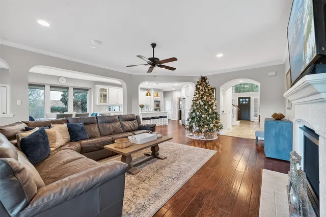 a view of a dining room with furniture and wooden floor