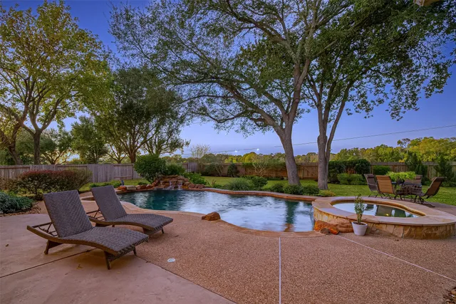 a lake view with sitting space and garden