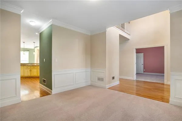 a kitchen with stainless steel appliances granite countertop a sink and a granite counter tops