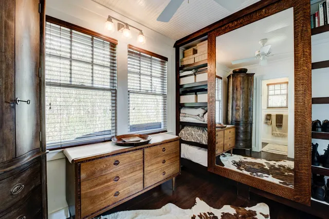 a kitchen with stainless steel appliances kitchen island granite countertop a stove and a refrigerator