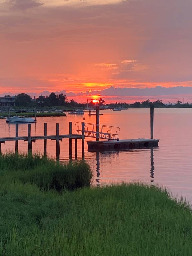 Undisclosed Address Sag Harbor, NY 11963 - Photo 15 of 16 a view of a lake from a yard