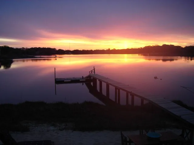 a view of lake from balcony with outdoor space