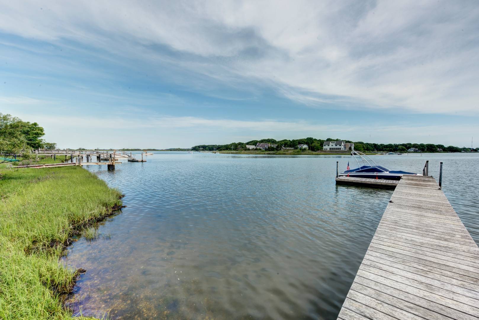 Undisclosed Address Sag Harbor, NY 11963 - Photo 5 of 16 a view of a lake with houses