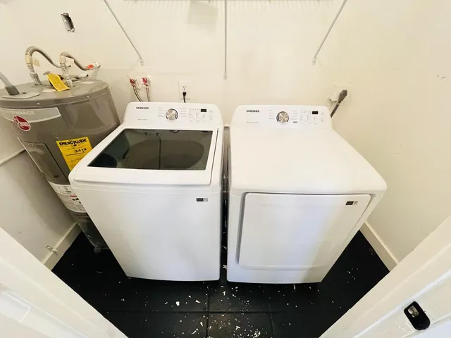 a utility room with dryer and washer