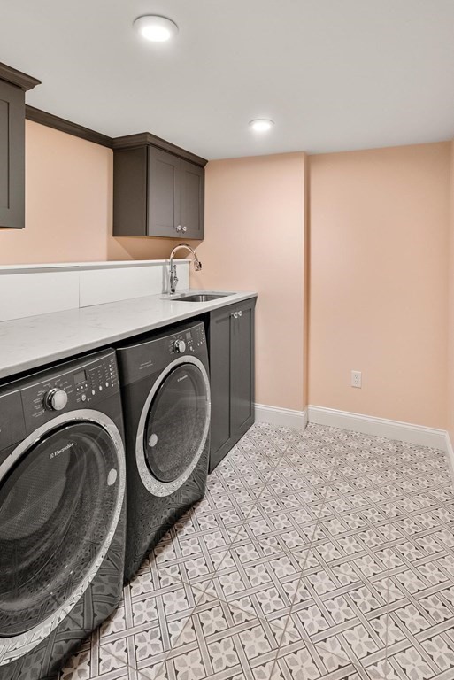 77 Beaconsfield Road, Unit 77 Brookline, MA 02445 - Photo 19 of 21 a utility room with sink dryer and washer