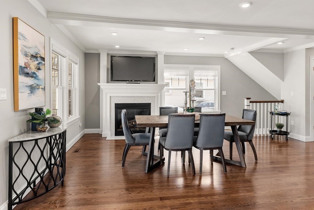 77 Beaconsfield Road, Unit 77 Brookline, MA 02445 - Photo 7 of 21 a view of a dining room with furniture window and wooden floor