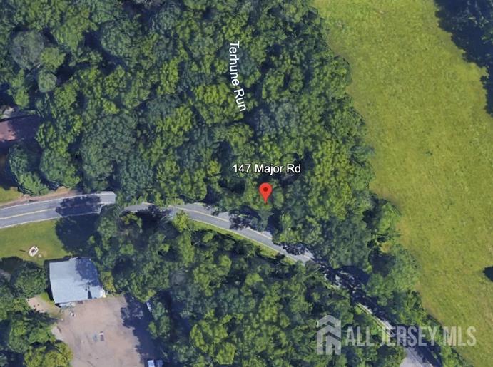 147-151 Major Road Monmouth Junction, NJ 08852 - Photo 3 of 4 an aerial view of residential house with outdoor space and trees all around