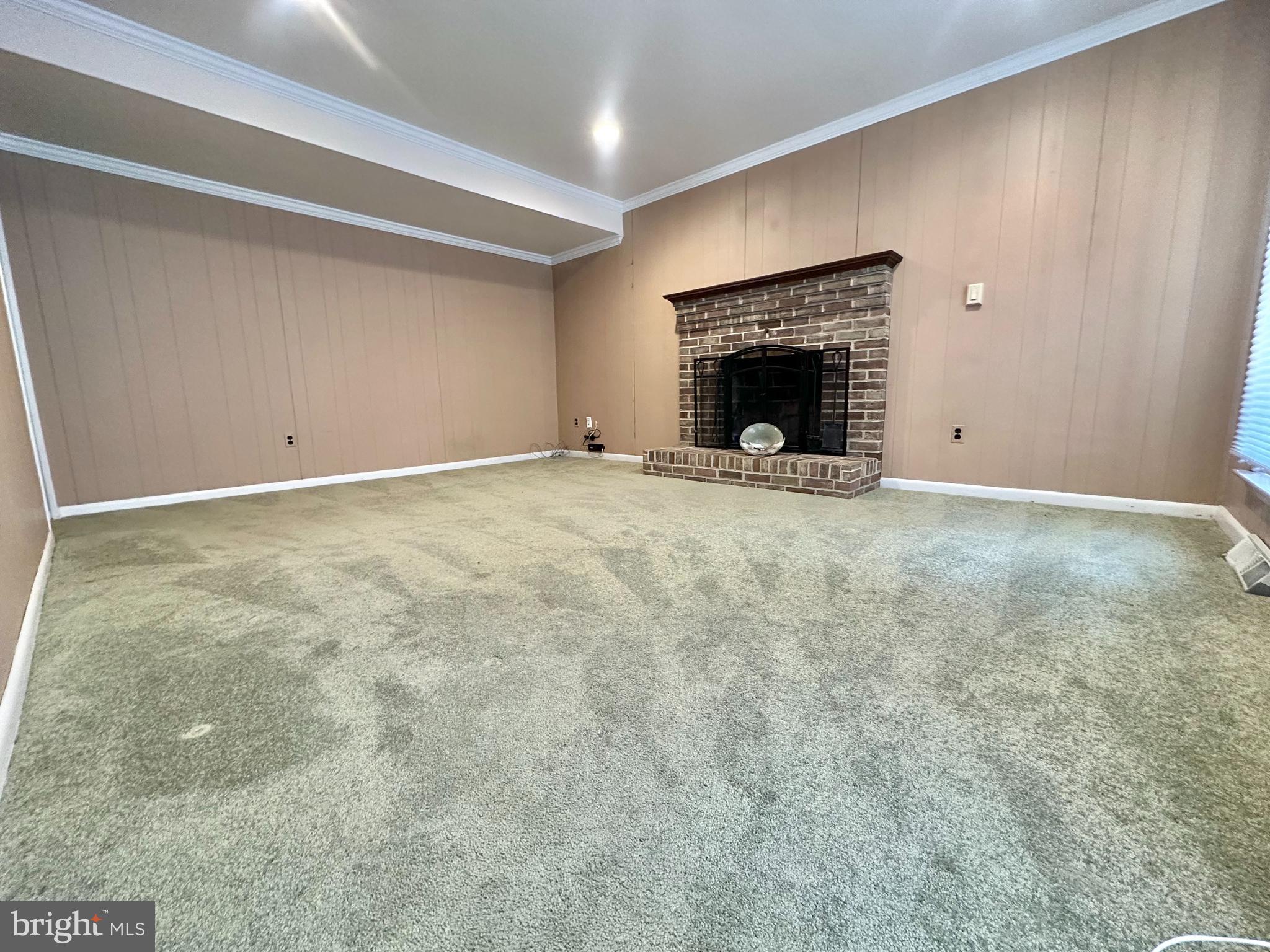 9805 Binyon Court Fort Washington, MD 20744 - Photo 11 of 25 a view of an empty room and fire place