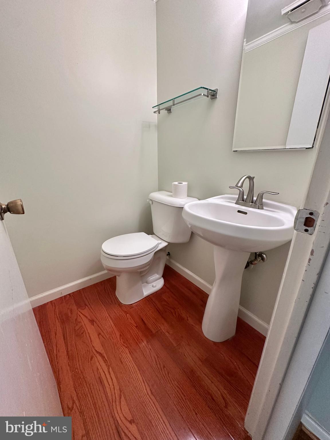 9805 Binyon Court Fort Washington, MD 20744 - Photo 12 of 25 a bathroom with a sink and a toilet