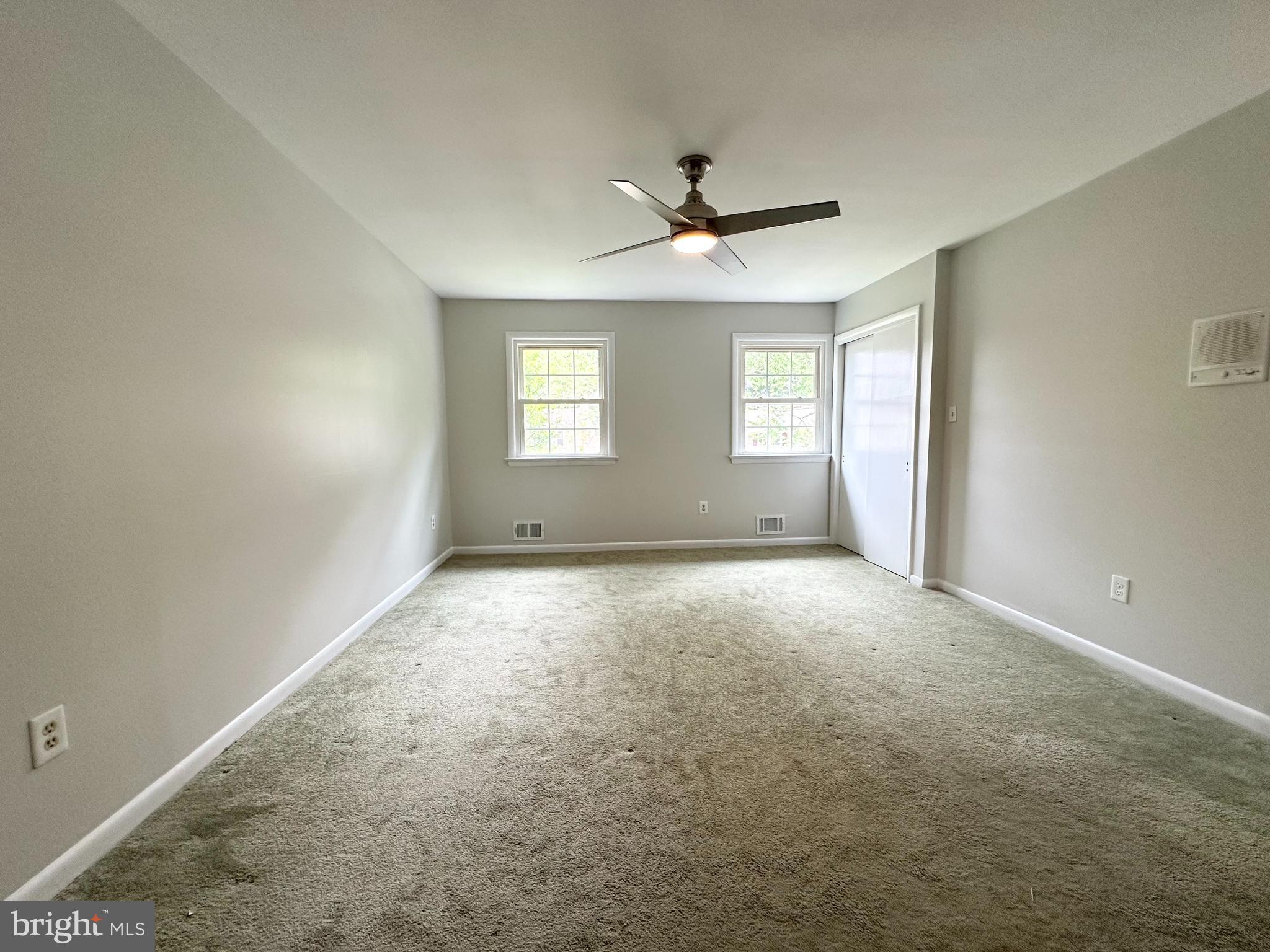 9805 Binyon Court Fort Washington, MD 20744 - Photo 15 of 25 a view of empty room with windows