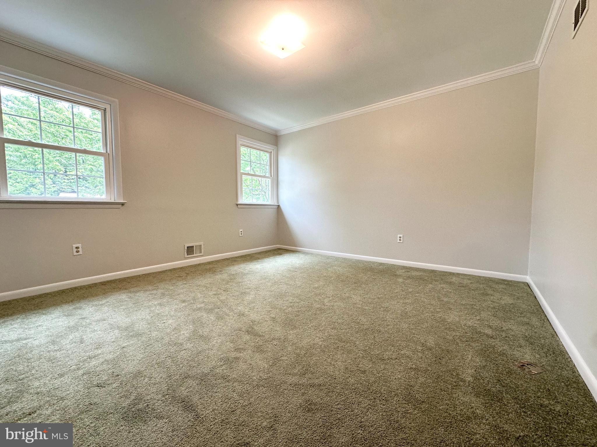9805 Binyon Court Fort Washington, MD 20744 - Photo 18 of 25 an empty room with windows