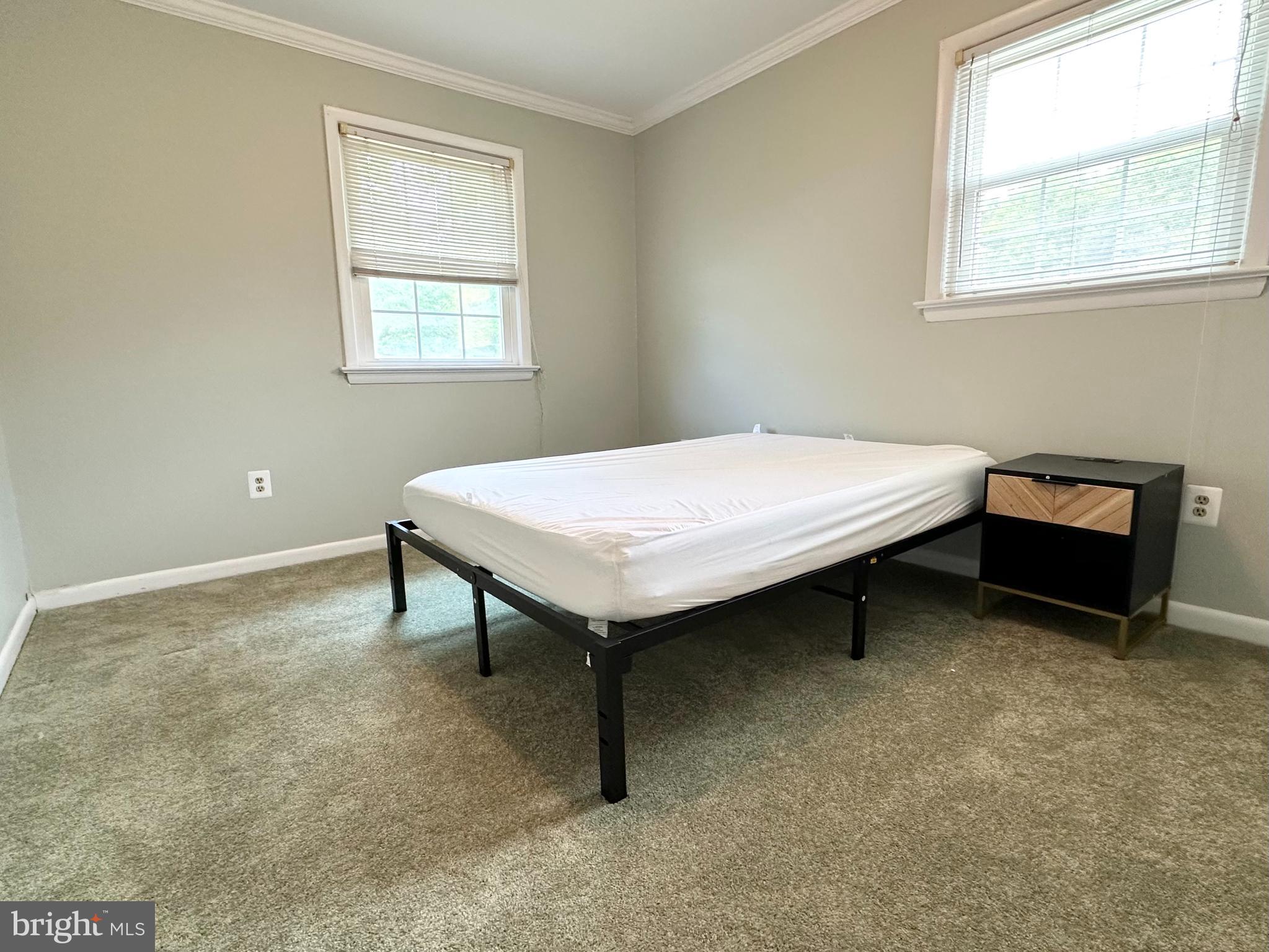9805 Binyon Court Fort Washington, MD 20744 - Photo 20 of 25 a room with table and window