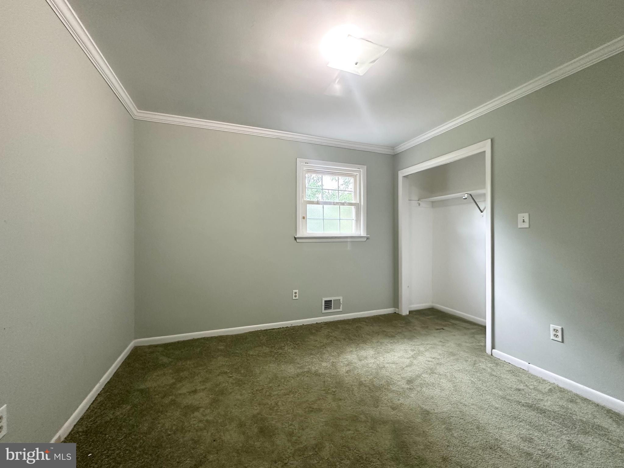 9805 Binyon Court Fort Washington, MD 20744 - Photo 21 of 25 an empty room with windows