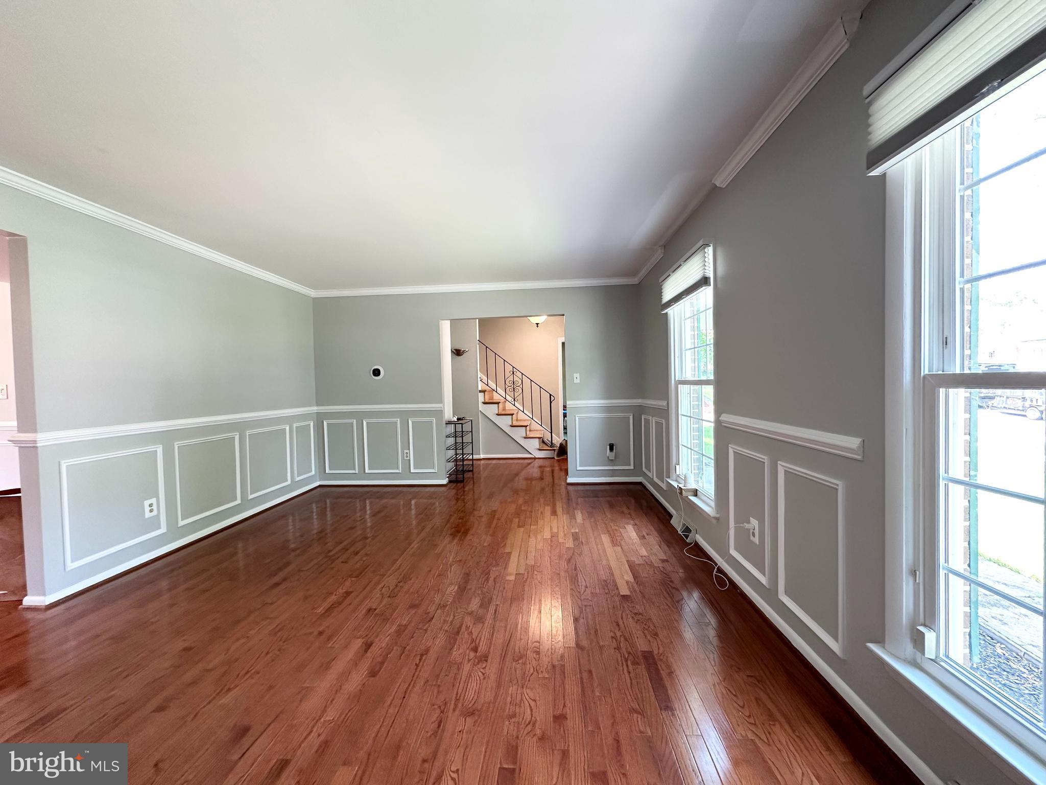 9805 Binyon Court Fort Washington, MD 20744 - Photo 3 of 25 wooden floor in an empty room with a window