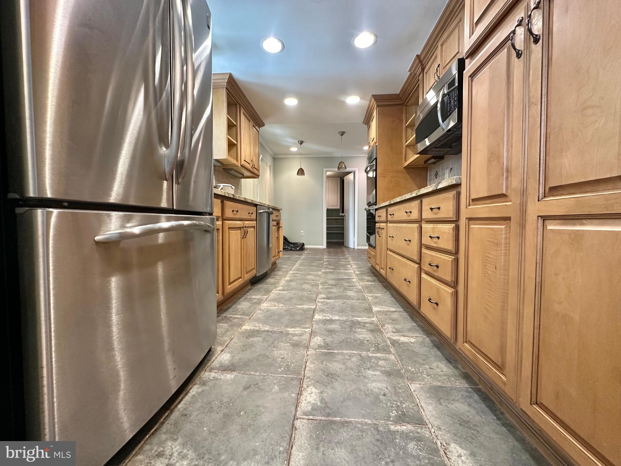 9805 Binyon Court Fort Washington, MD 20744 - Photo 6 of 25 a view of entryway with wooden floor