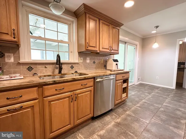 a view of an empty room with a mirror