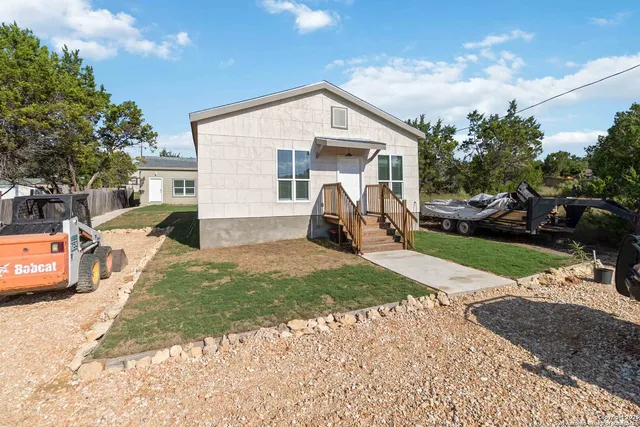 a view of a house with a patio