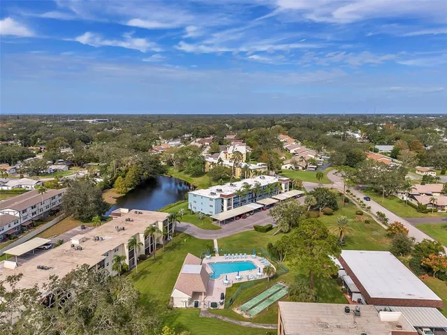 a roof deck with a table and chairs