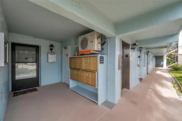 a view of a livingroom with furniture and garage