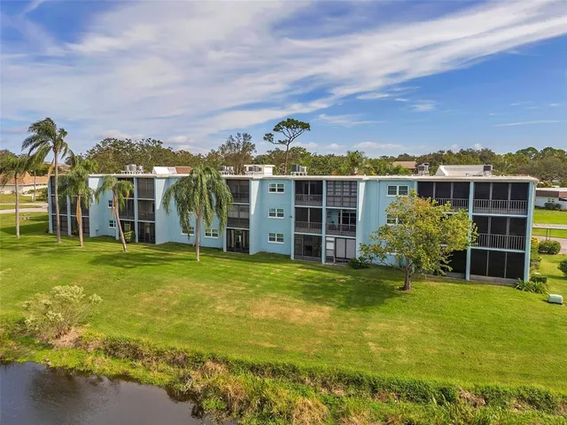an aerial view of a house with a garden