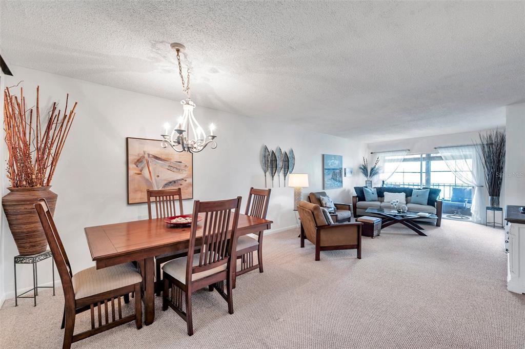 1430 Heather Ridge Boulevard, Unit 304 Dunedin, FL 34698 - Photo 5 of 36 a view of a livingroom and dining room