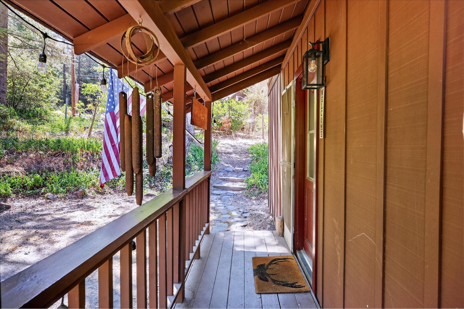 44800 Mountain Meadow Road Oakhurst, CA 93644 - Photo 15 of 41 a view of balcony and wooden floor