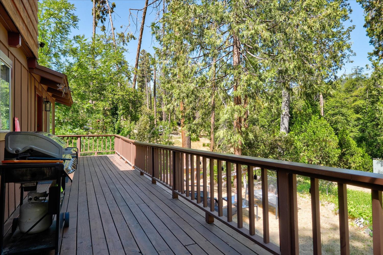 44800 Mountain Meadow Road Oakhurst, CA 93644 - Photo 37 of 41 a view of balcony and wooden floor