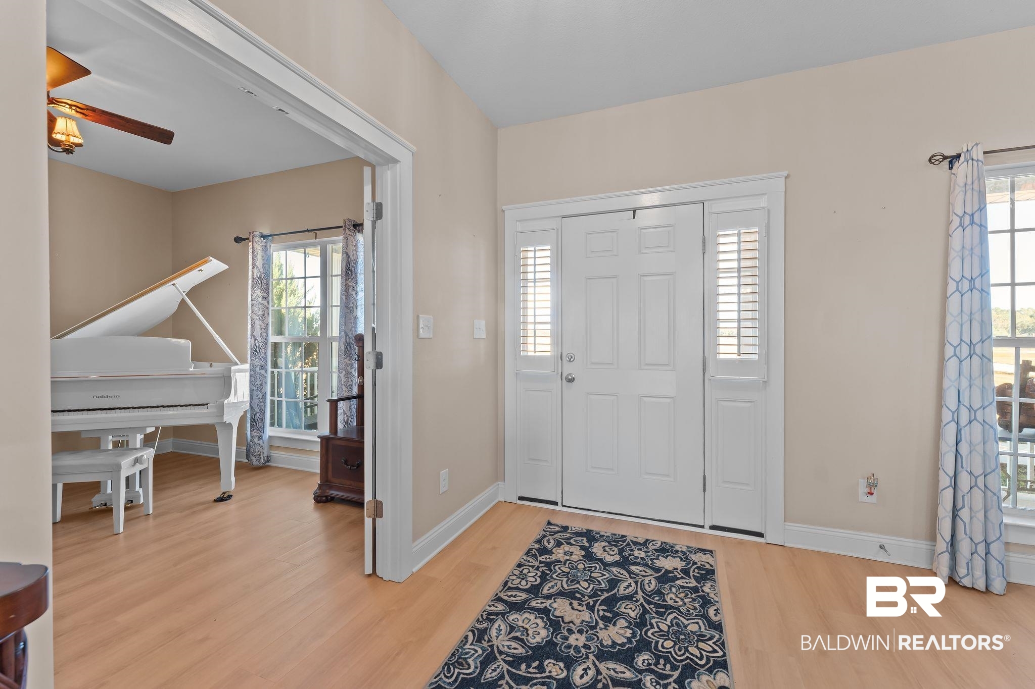 28980 Comstock Road Elberta, AL 36530 - Photo 13 of 38 Foyer entrance with light wood-type flooring and ceiling fan