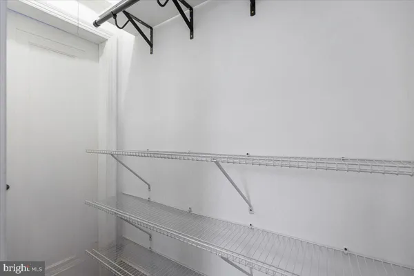 a view of small space with racks on the wall