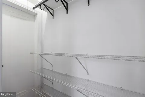 a view of small space with racks on the wall