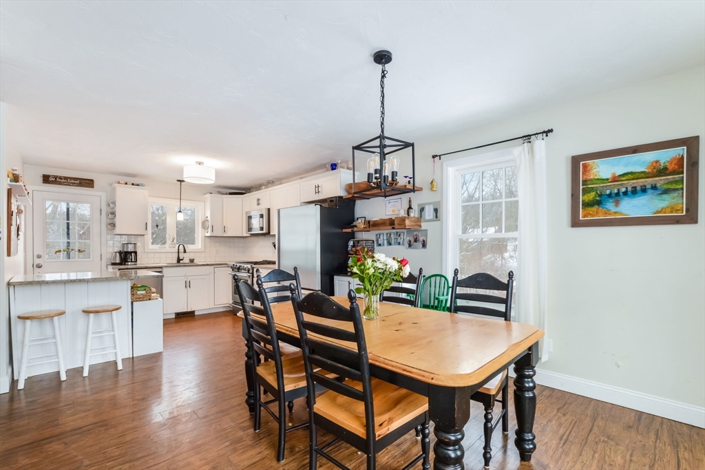 63 Wareham Street Middleboro, MA 02346 - Photo 9 of 23 a view of a dining room with furniture and wooden floor