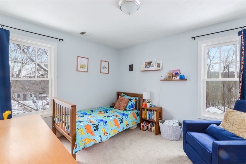 63 Wareham Street Middleboro, MA 02346 - Photo 10 of 23 a bedroom with furniture and a window