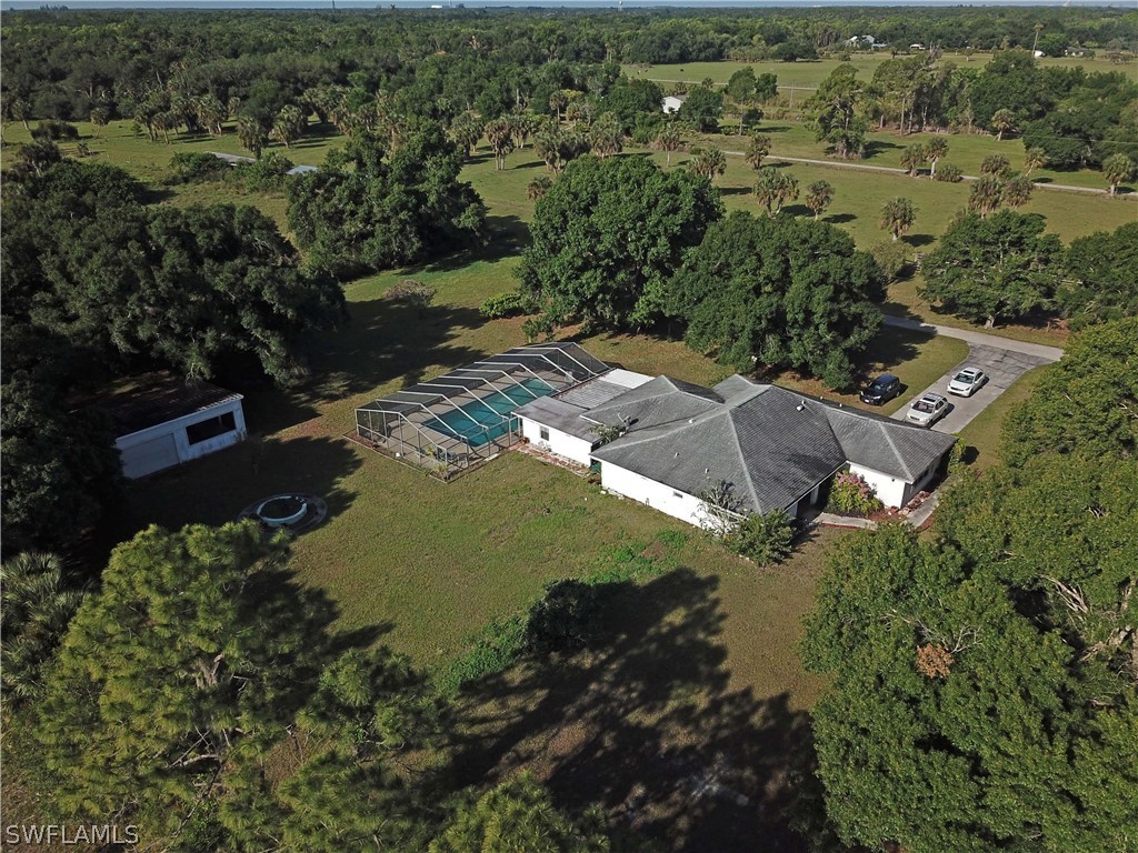 14430 Cemetery Road Fort Myers, FL 33905 - Photo 1 of 35 an aerial view of residential house with outdoor space
