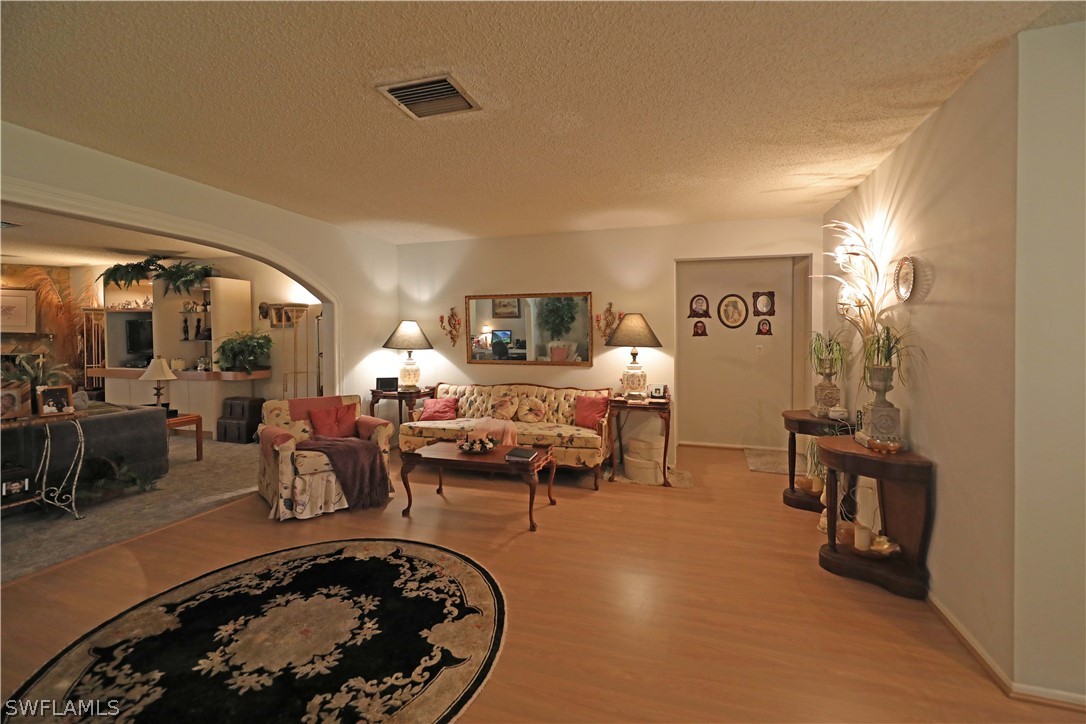 14430 Cemetery Road Fort Myers, FL 33905 - Photo 16 of 35 a living room with furniture rug and window