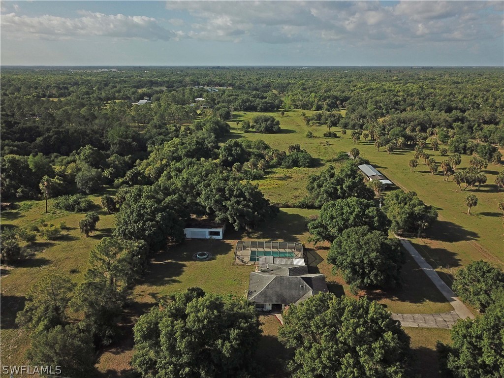 14430 Cemetery Road Fort Myers, FL 33905 - Photo 2 of 35 an aerial view of residential house with beach and trees