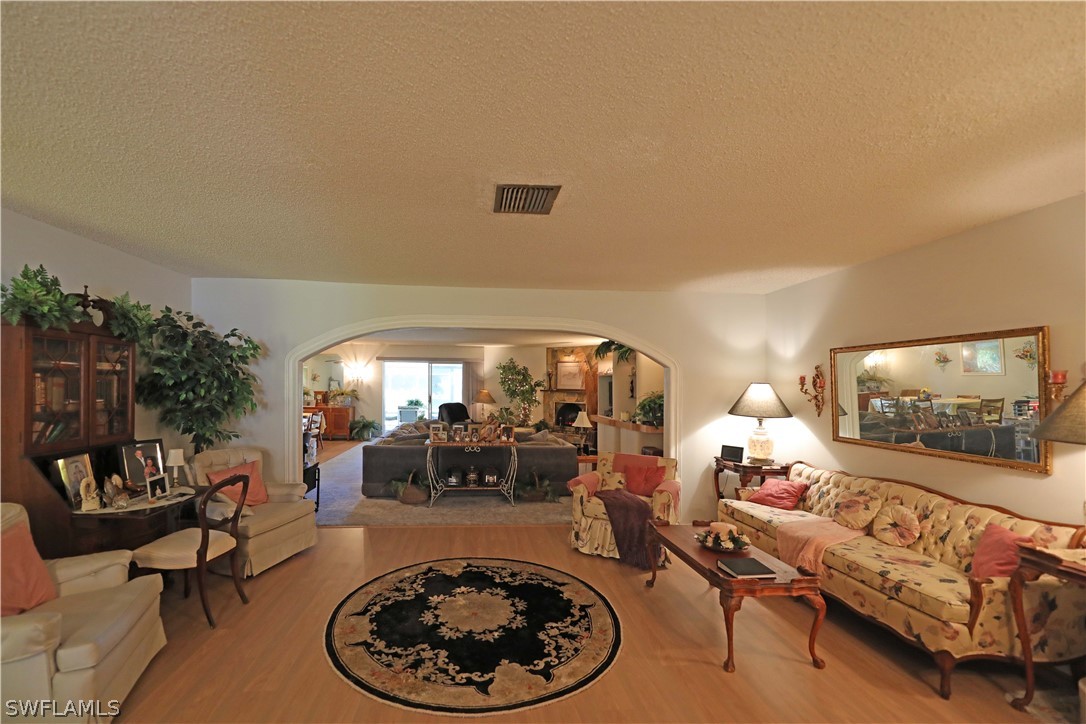 14430 Cemetery Road Fort Myers, FL 33905 - Photo 5 of 35 a living room with furniture and a large window