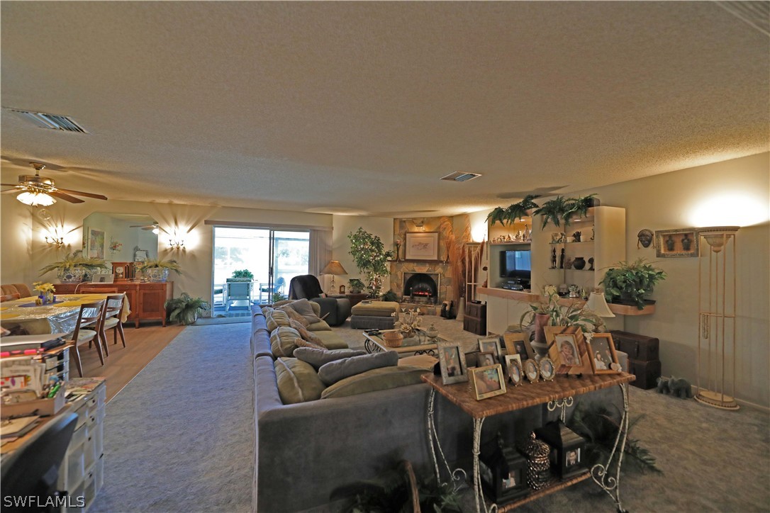 14430 Cemetery Road Fort Myers, FL 33905 - Photo 9 of 35 a living room with furniture and a large window