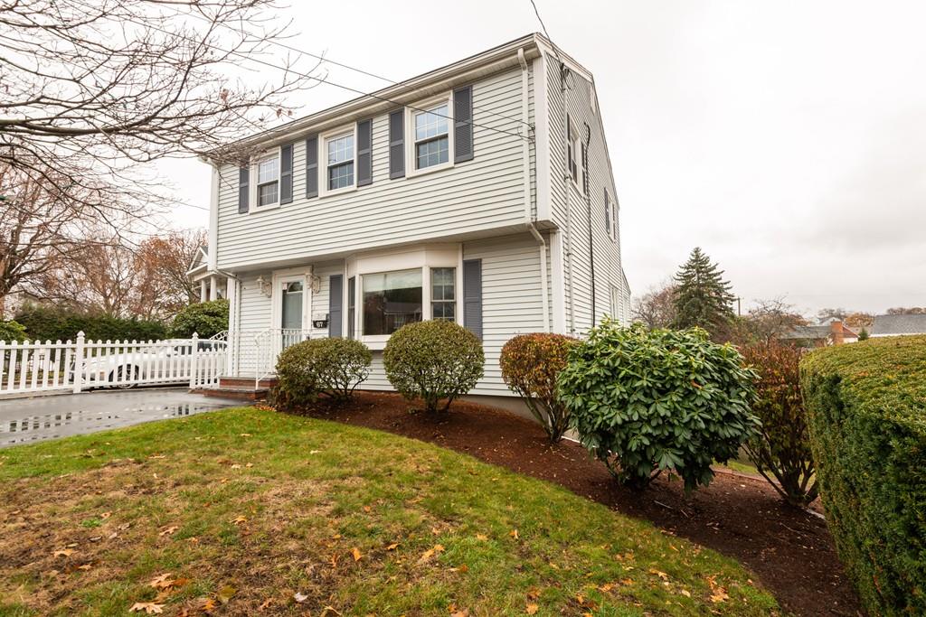 26 Doane Road Medford, MA 02155 - Photo 1 of 24 a front view of a house with garden