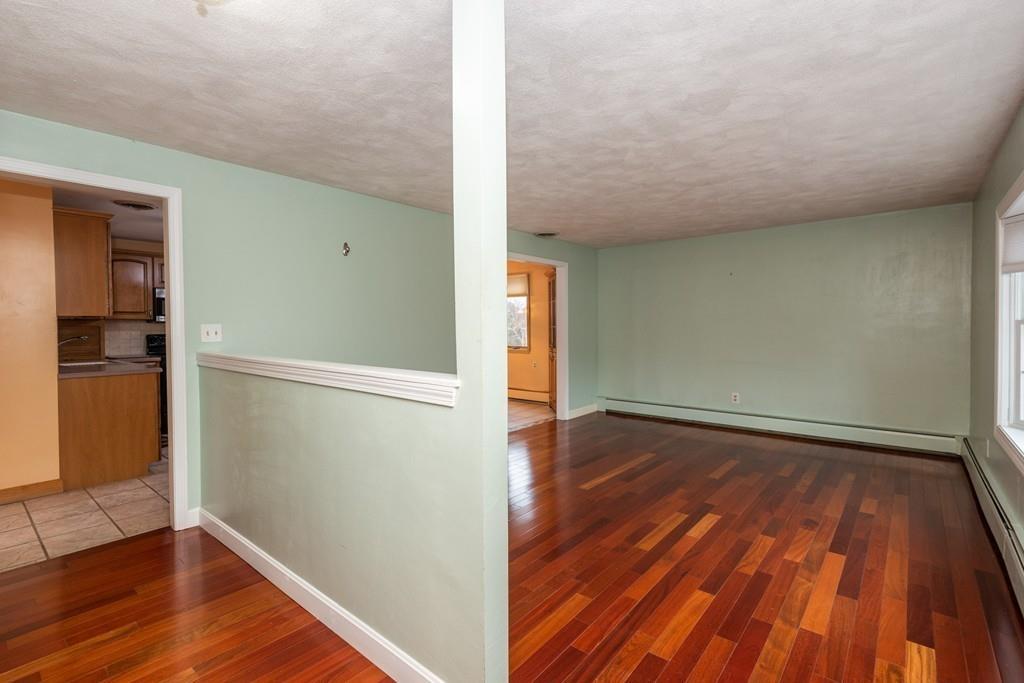 26 Doane Road Medford, MA 02155 - Photo 11 of 24 wooden floor in an empty room