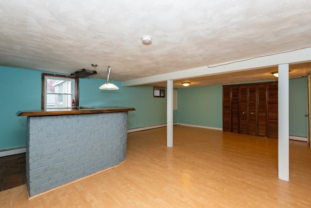 26 Doane Road Medford, MA 02155 - Photo 22 of 24 a view of a hallway with kitchen