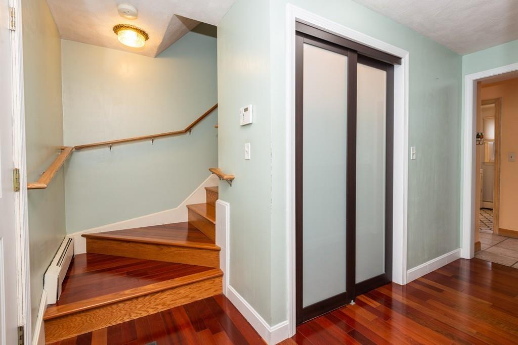 26 Doane Road Medford, MA 02155 - Photo 8 of 24 a view of entryway and hall with wooden floor