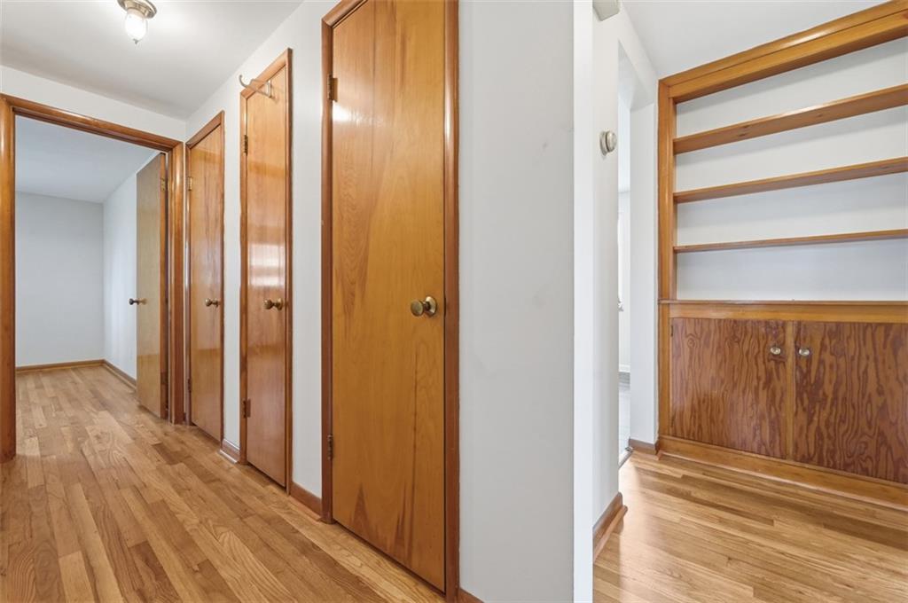 6 Greenview Drive McKees Rocks, PA 15136 - Photo 12 of 44 a view of a hallway with wooden floor and closet