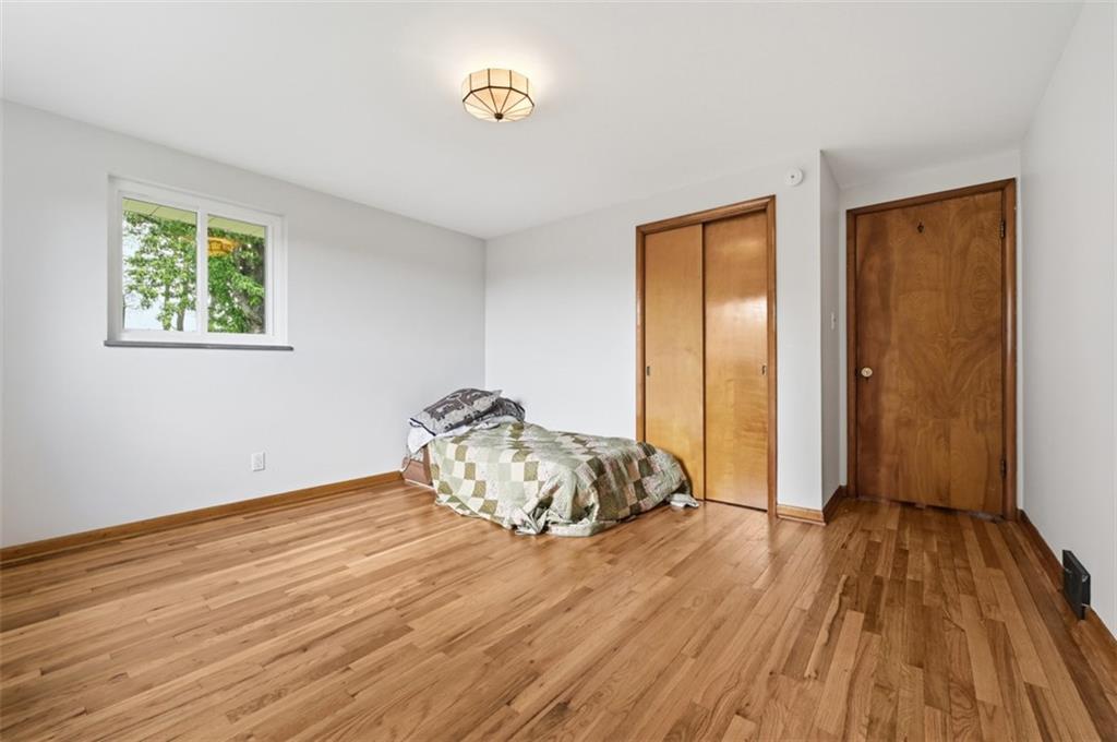 6 Greenview Drive McKees Rocks, PA 15136 - Photo 18 of 44 a big room with wooden floor and natural light