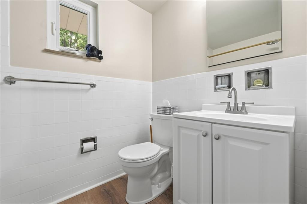 6 Greenview Drive McKees Rocks, PA 15136 - Photo 19 of 44 a bathroom with a toilet sink and mirror